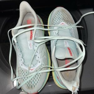 Hoka shoes. Newly cleaned. little tear in the back bc of my puppy.